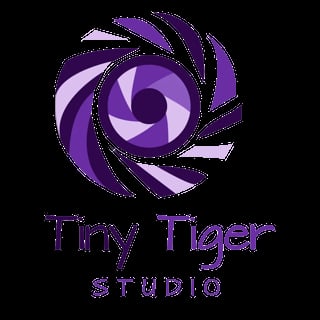 Tiny Tiger Studio logo featuring a purple spiral camera aperture design with studio name text below
